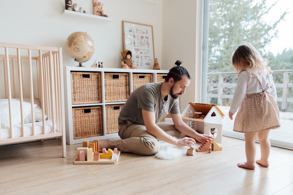 Photo Of Father Playing With Child